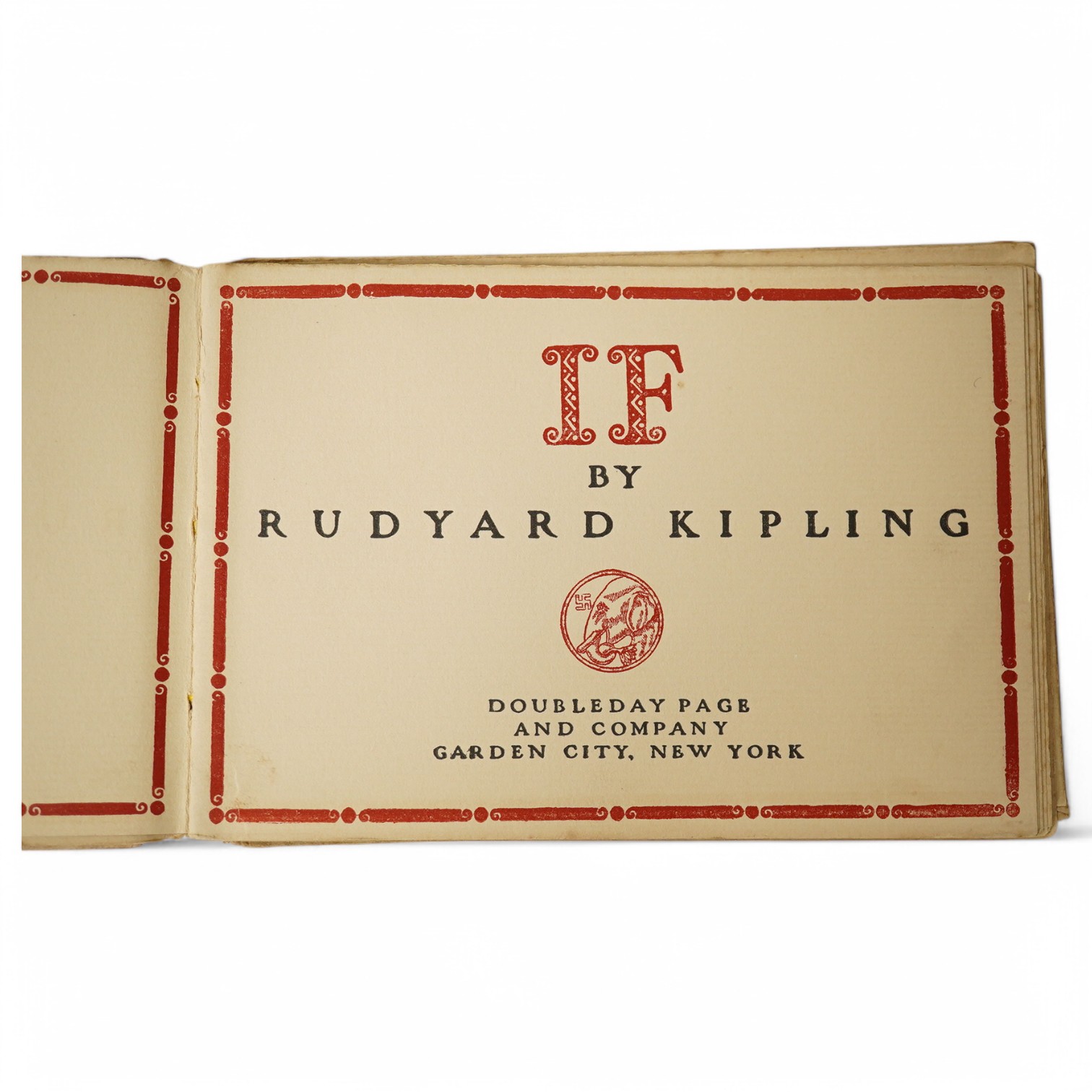 Kipling, Rudyard - ‘’If’’, oblong 8vo, cream boards lettered in red and black, Doubleday Page and Company, Garden City, New York, 1910, 16.5cm wide. Condition - spine and cover slightly torn and marked.